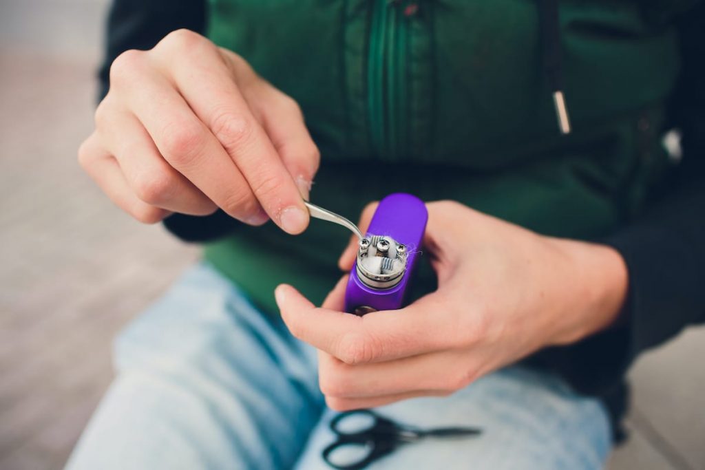 How to Make Vape Coils Last Longer: Cleaning and Maintaining Vape Coils Guide 9 remove the wicks from the coil